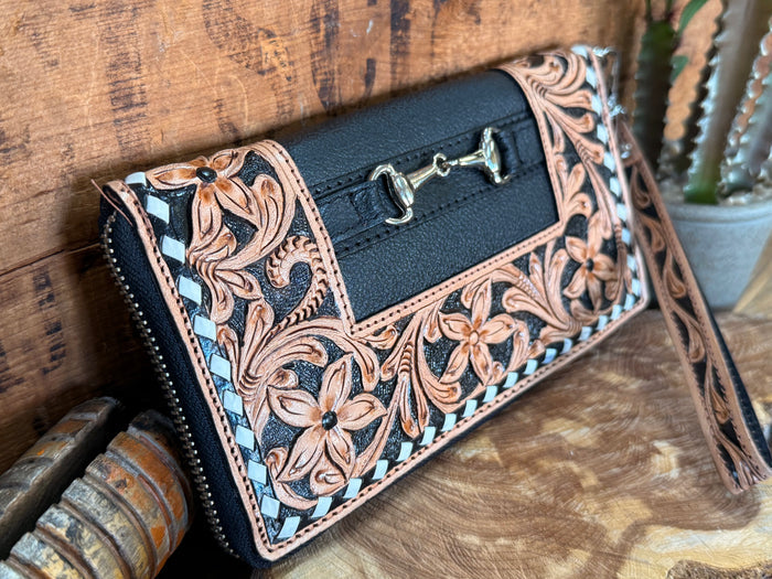 Tooled leather wristlet wallet with floral border, dark panel, zip-around closure