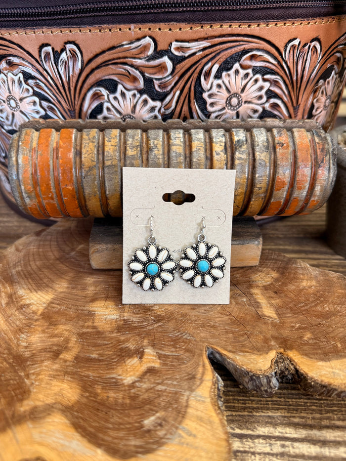 Flower fishhook earrings with white petals and blue center discs
