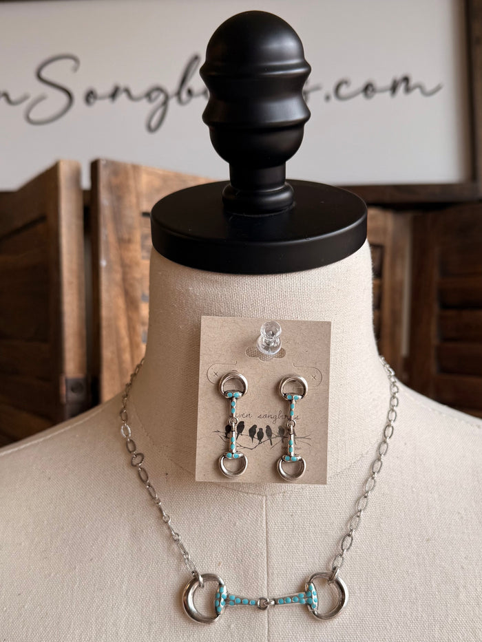 Silver-tone necklace with turquoise snaffle bit bar pendant and matching earrings