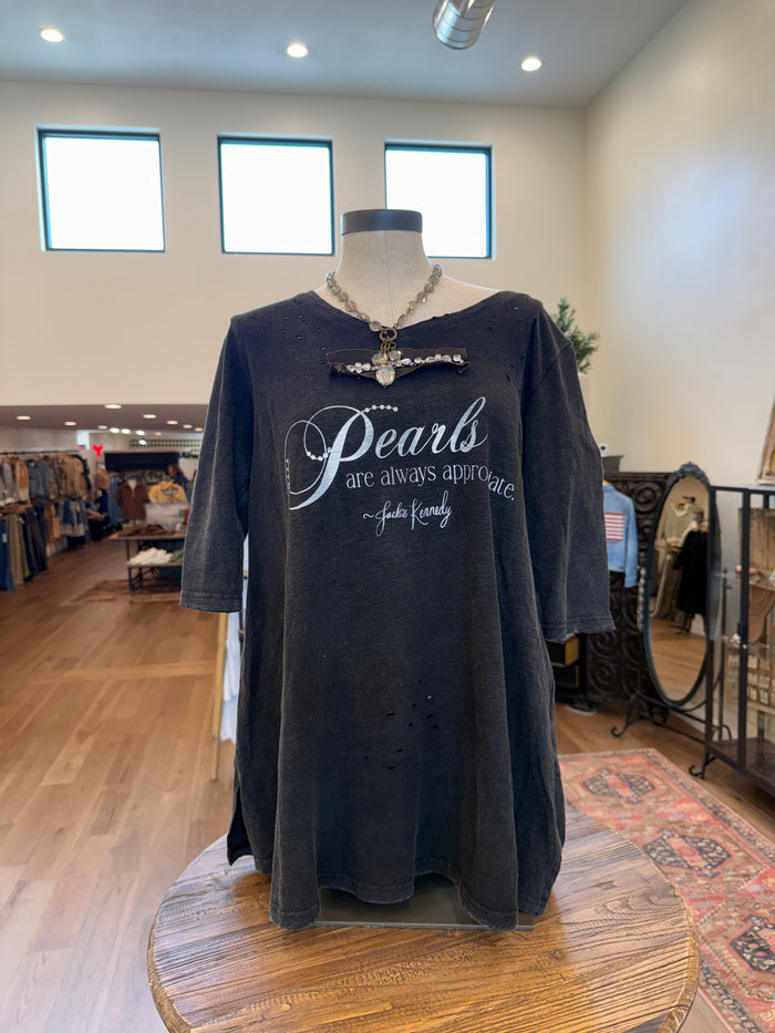 Pearl-embellished dark T-shirt with heart pendant and beaded trim at neckline