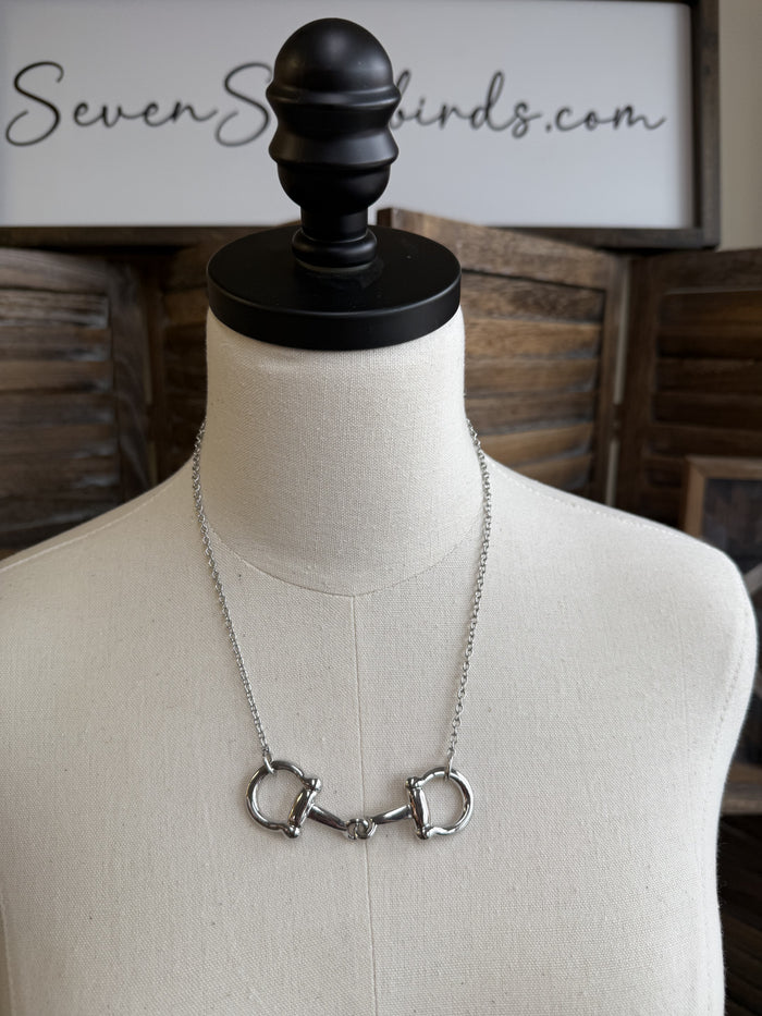 Snaffle bit necklace with silver-tone D-ring charms on link chain