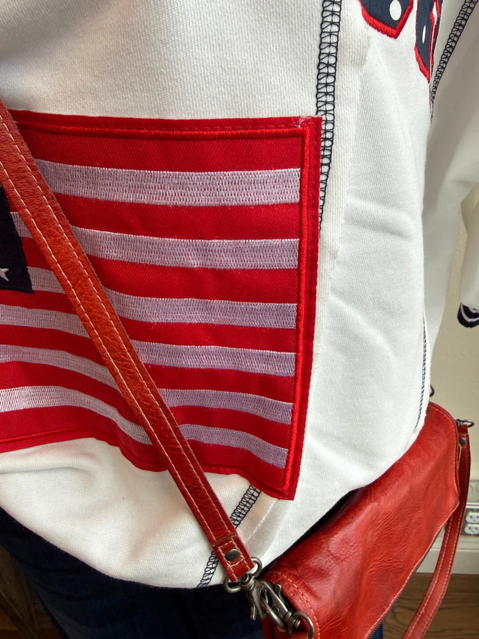 Cream short-sleeve sweatshirt with American flag graphic panel on front