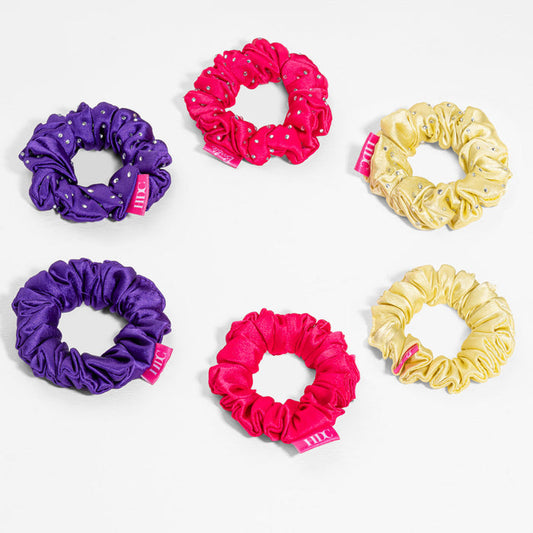 Barbie satin scrunchies in retro shades, adding a playful pop to ponytails, buns and braids