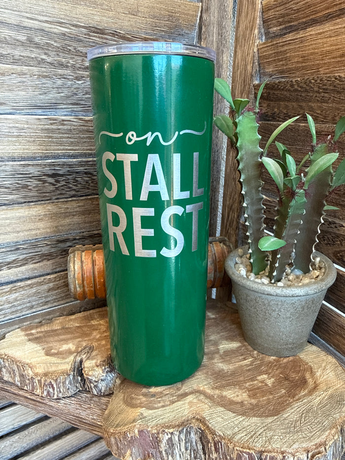 Green drink tumbler with 'STALL REST' and cursive 'con' top text
