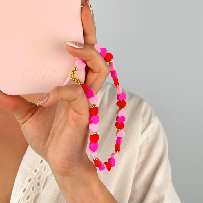 Hearts phone strap studio shoot showing close up details attached to phone case