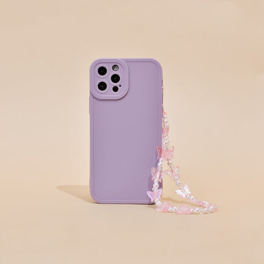 Lavender phone case with a holographic butterfly beaded strap on a beige background.