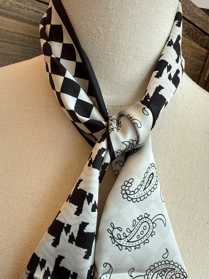 Black-and-white twilly scarf with checkered, cow, and paisley prints