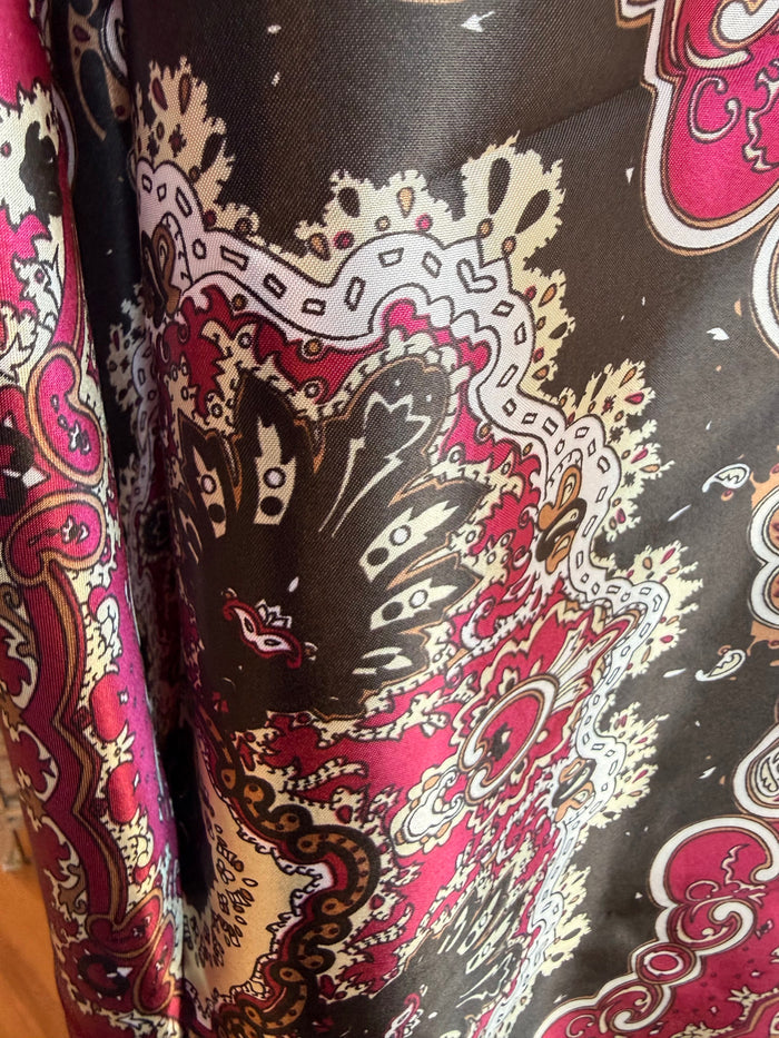 Paisley wild rag scarf with burgundy and cream motifs on dark base