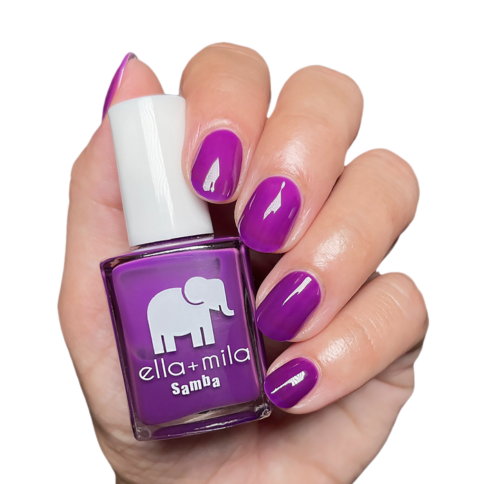 Chicha neon purple nail polish manicure on a light skin tone with the bottle