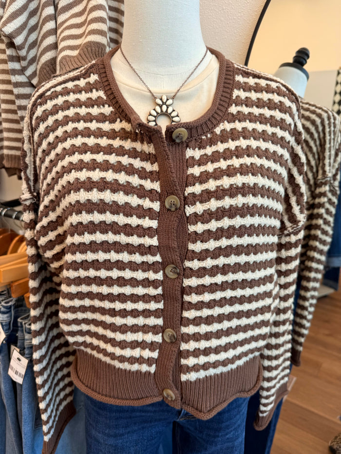 Striped knit cropped cardigan with chocolate-brown button placket and cream rows