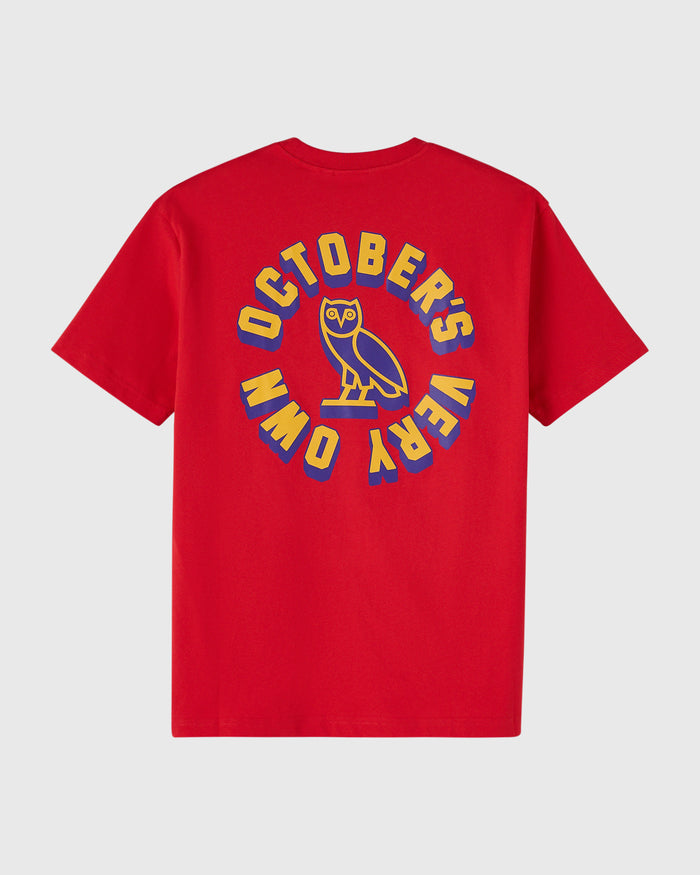 Red t-shirt with yellow and blue circular wordmark graphic featuring an owl design on back.