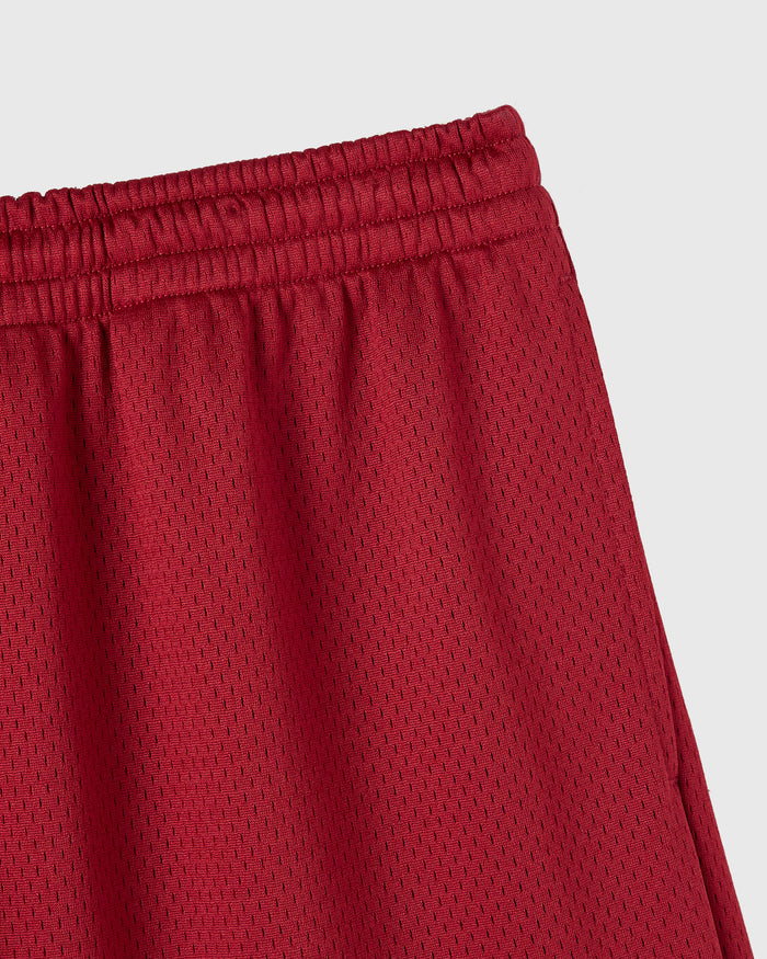 Deep red mesh shorts with elastic waistband and textured fabric pattern.