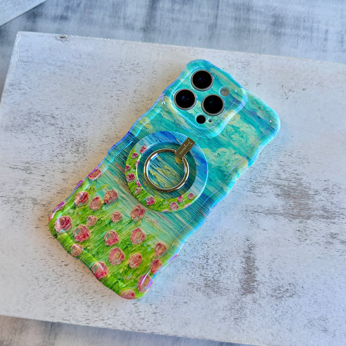 Coastal Bloom oil painting style MagSafe phone grip ring with blue sky and pink wildflowers compatible with iPhone and Samsung