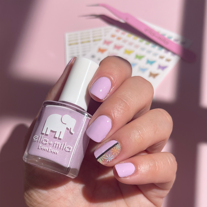 Come Fly With Me butterfly decals on a lilac manicure with the decal sheet and bottle
