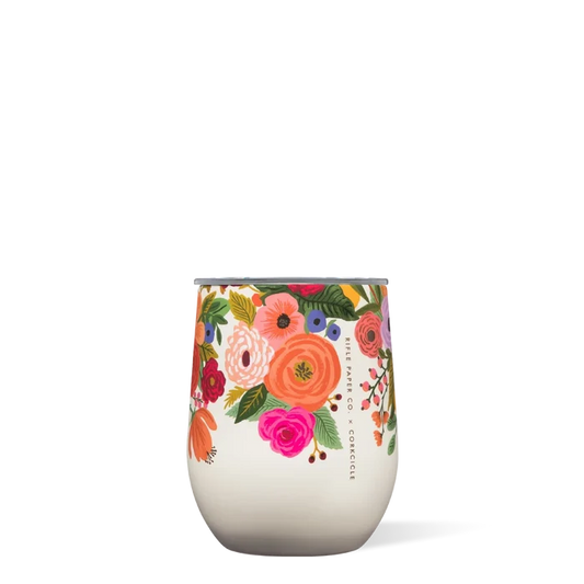 A cream-colored stemless cup with a floral pattern from Rifle Paper Co.