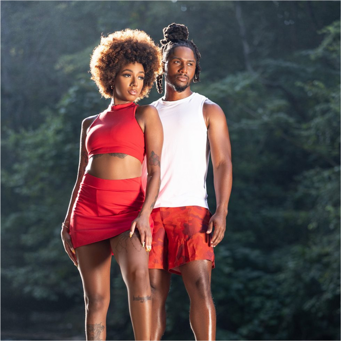 CREME OF NATURE sulfate free argan oil shampoo shown with two models with textured hair outdoors