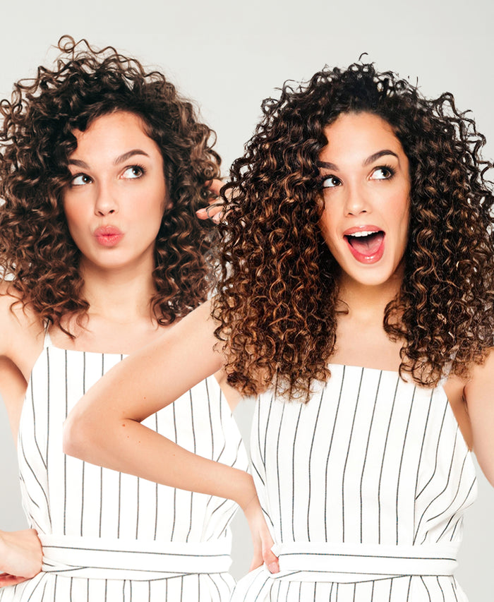 curly (3A curls) tape-in hair extensions mocha balayage.