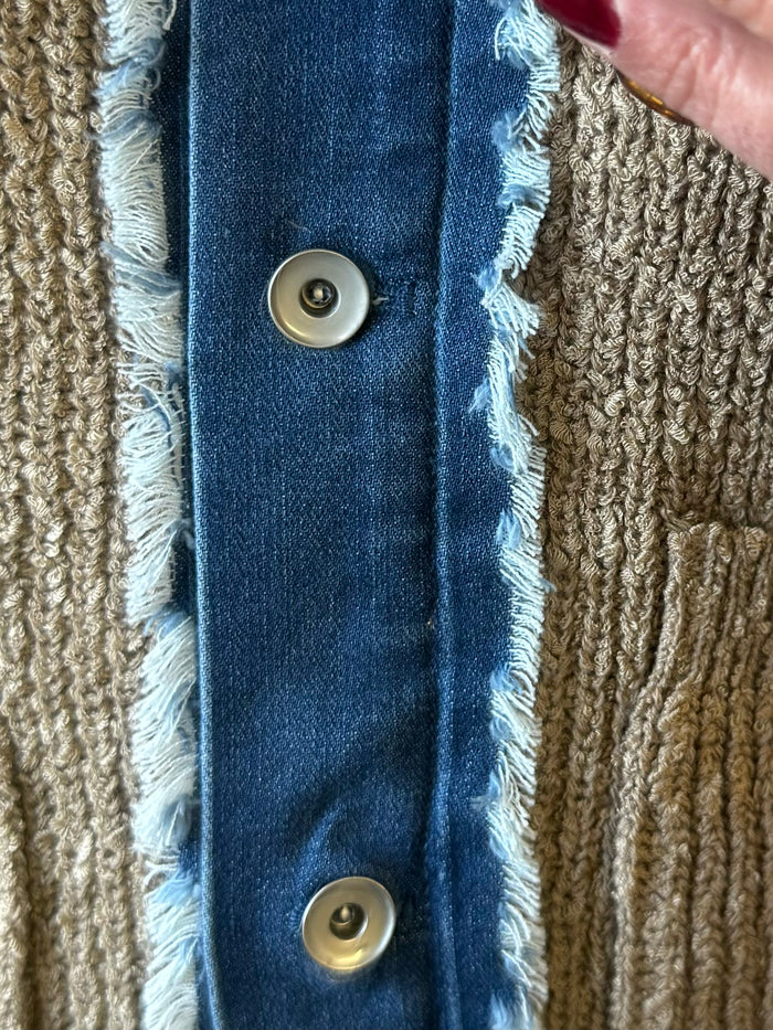 Denim front panel on knit cardigan with brass snaps and frayed edges