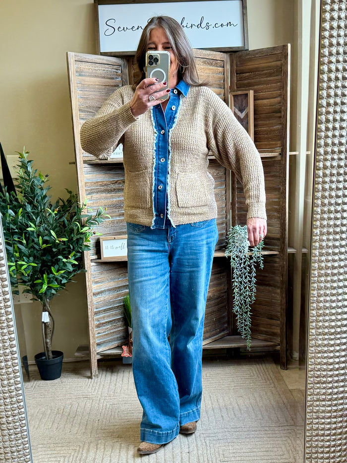 Beige knit cardigan with denim button front and brass snaps, long sleeves