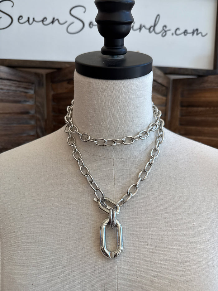 Chunky silver double-link chain necklace with large oval pendant