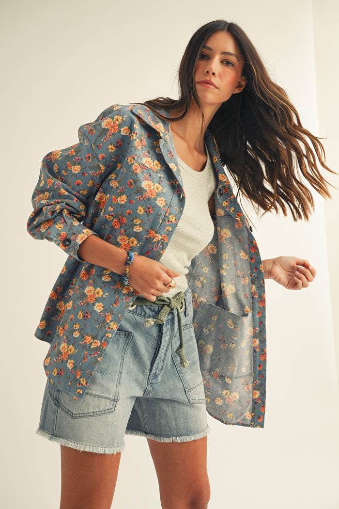 Floral denim button-front jacket with long sleeves, collar, front pockets