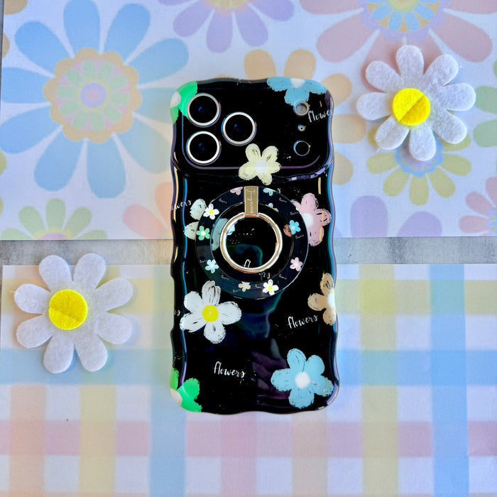 Flower Pop pattern MagSafe phone grip ring with sketched colorful flowers and script text on black background compatible with iPhone and Samsung