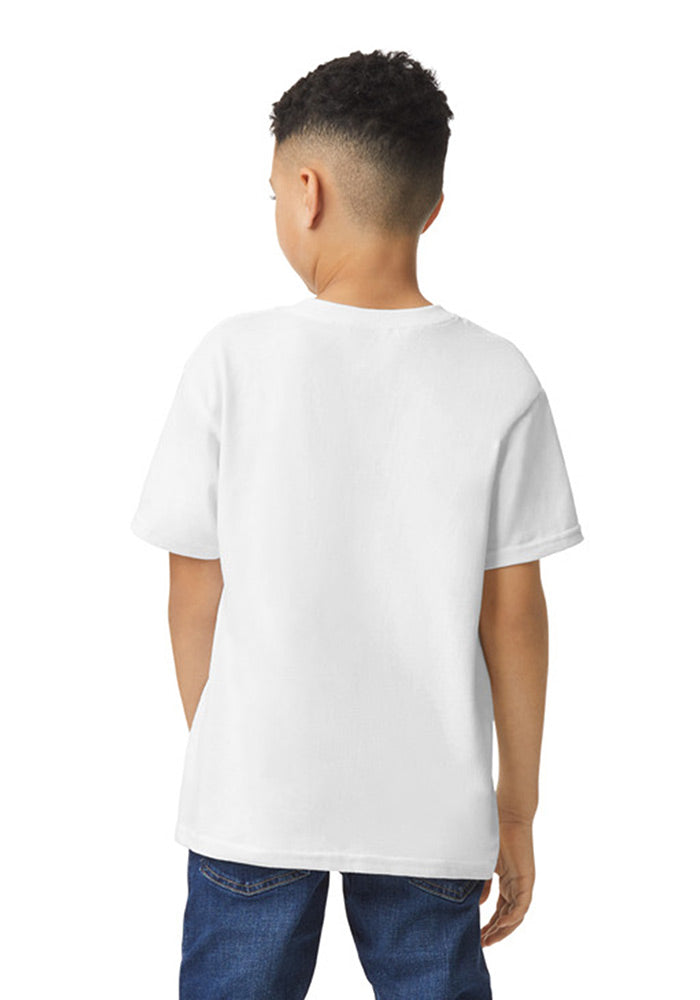 Back view of a boy wearing a Gildan 5.3 oz. heavy cotton, short-sleeved white t-shirt on a white background.