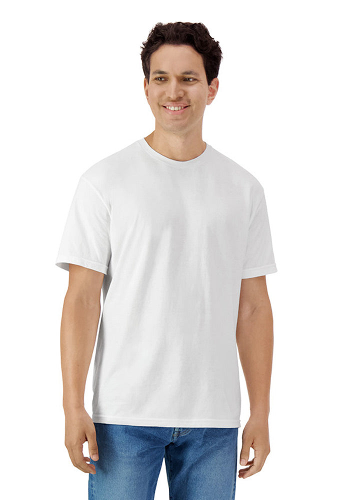 Man wearing a relaxed fit plain white short sleeved t-shirt and blue jeans on a white background