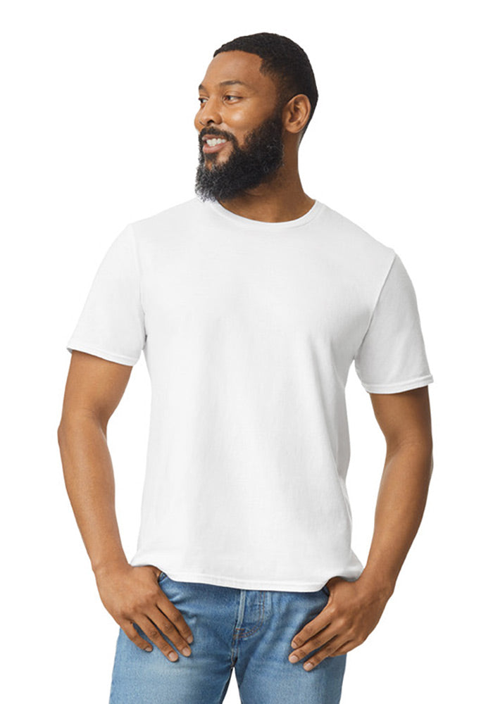 Man wearing a plain white cotton short-sleeved t-shirt and blue jeans on a white background