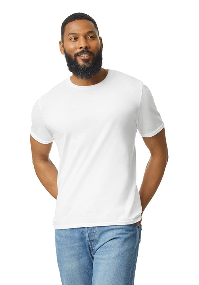 Man wearing a plain white cotton short-sleeved t-shirt and blue jeans on a white background
