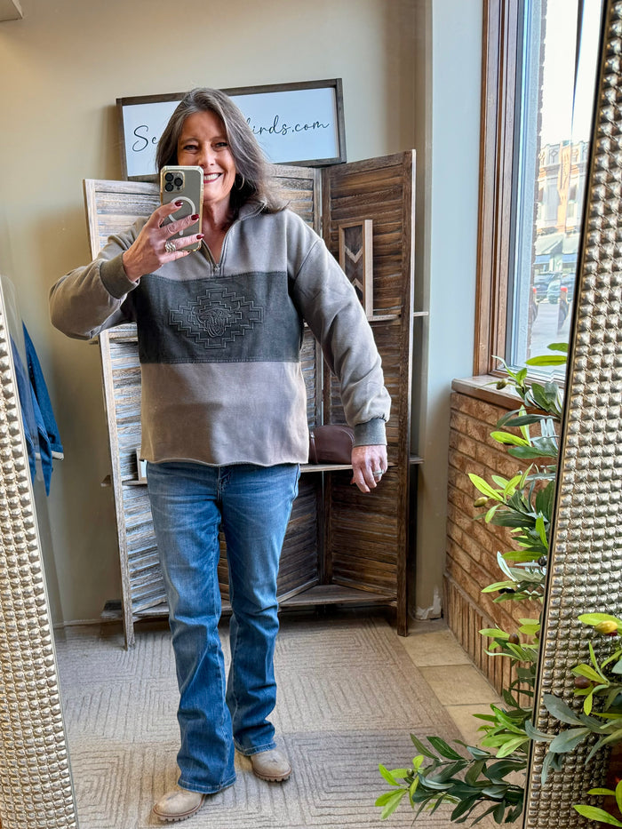 Two-tone 1/4 zip sweatshirt with steerhead logo, gray and dark charcoal