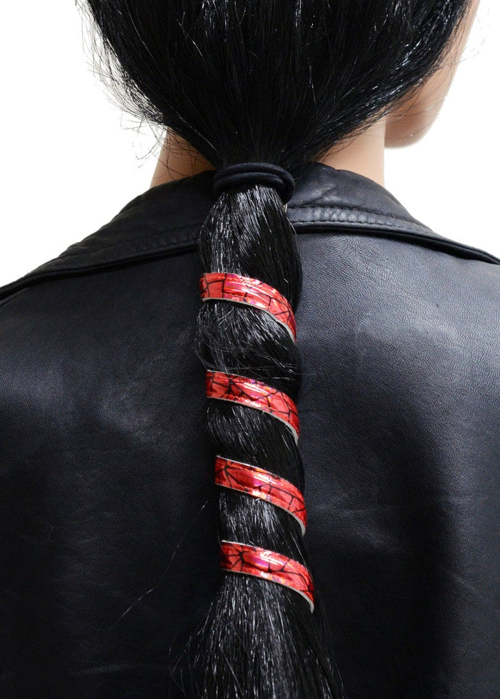 Model wearing 12 inch holographic red faux leather ponytail wrap, spiral hair twister, back view in ponytail