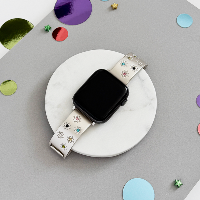 White Apple Watch strap with colorful star accents from Coconut Lanes Ibiza Coloured Stone collection in Starlight.