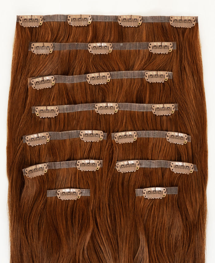 invisible clip-in hair extensions pumpkin spice.