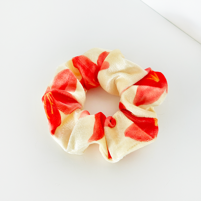 Cream scrunchie with red and orange floral pattern, Island Girl Ibiza Lily by Coconut Lane.
