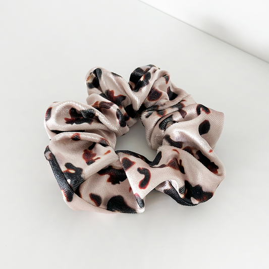 Velvet scrunchie in an ivory and brown tortoiseshell pattern by Coconut Lane.