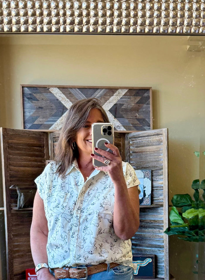 Light blue jackalope-print camp shirt with short sleeves and open collar