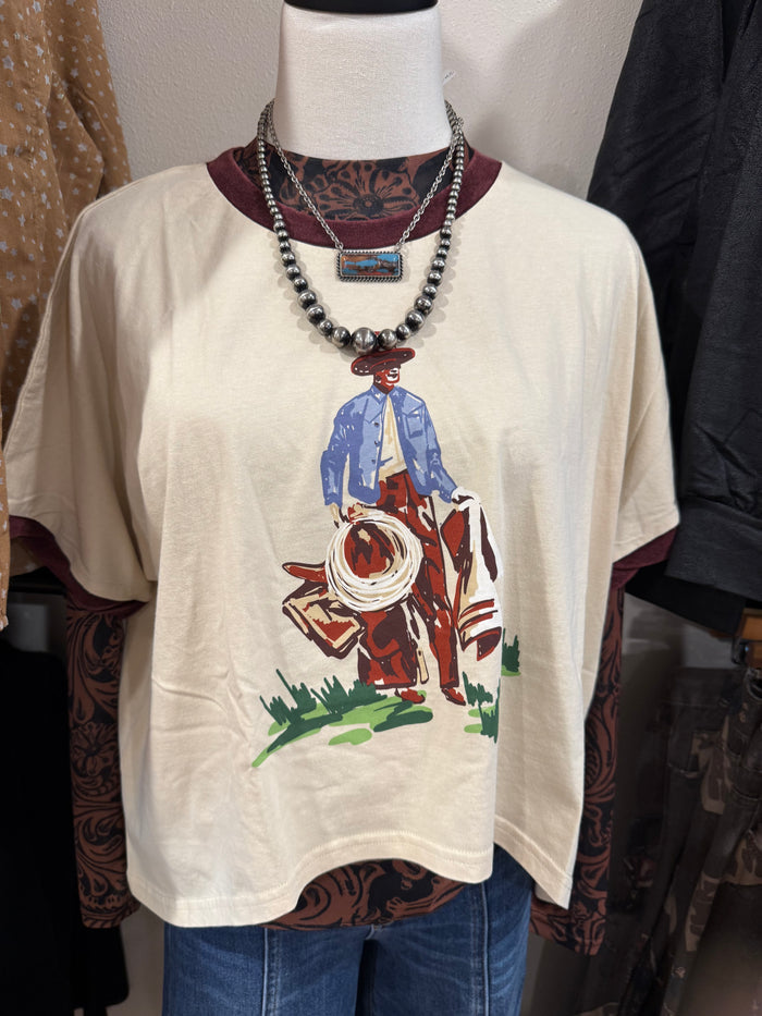 Cream crewneck graphic T-shirt featuring cowboy and lasso
