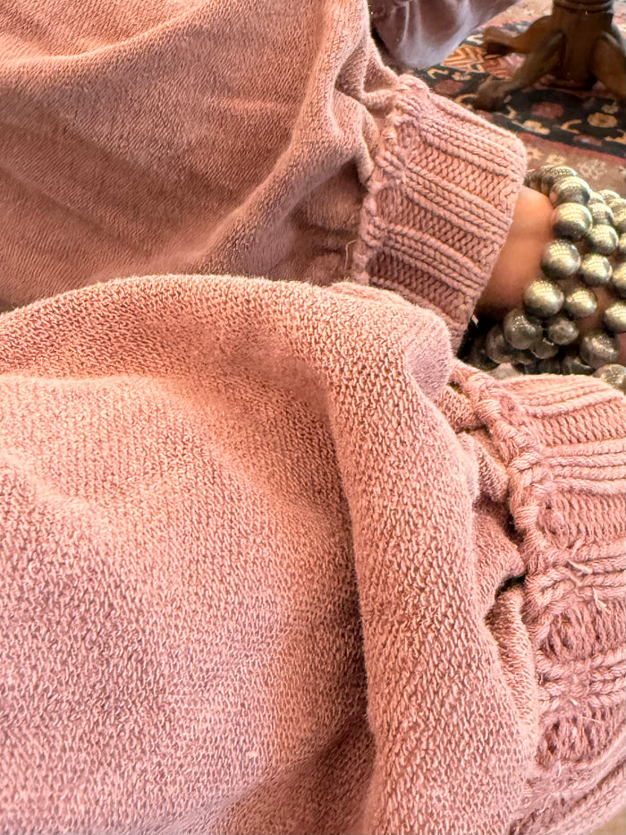Mauve washed cotton cardigan sleeve cuff with chunky knit ribbed trim and texture