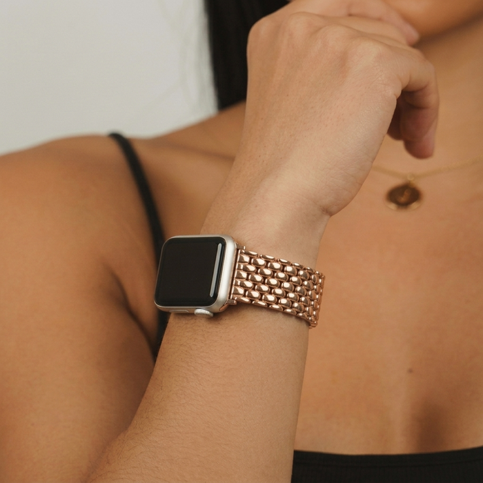 Girl wearing mermaid watch strap rose gold