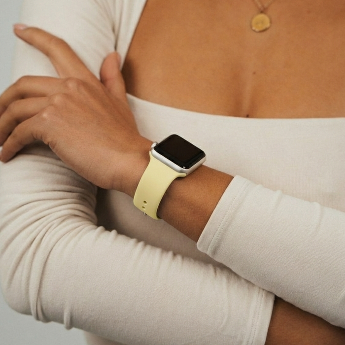 Girl close up of wrist wearing the NAKD Butter Yellow Watch Strap