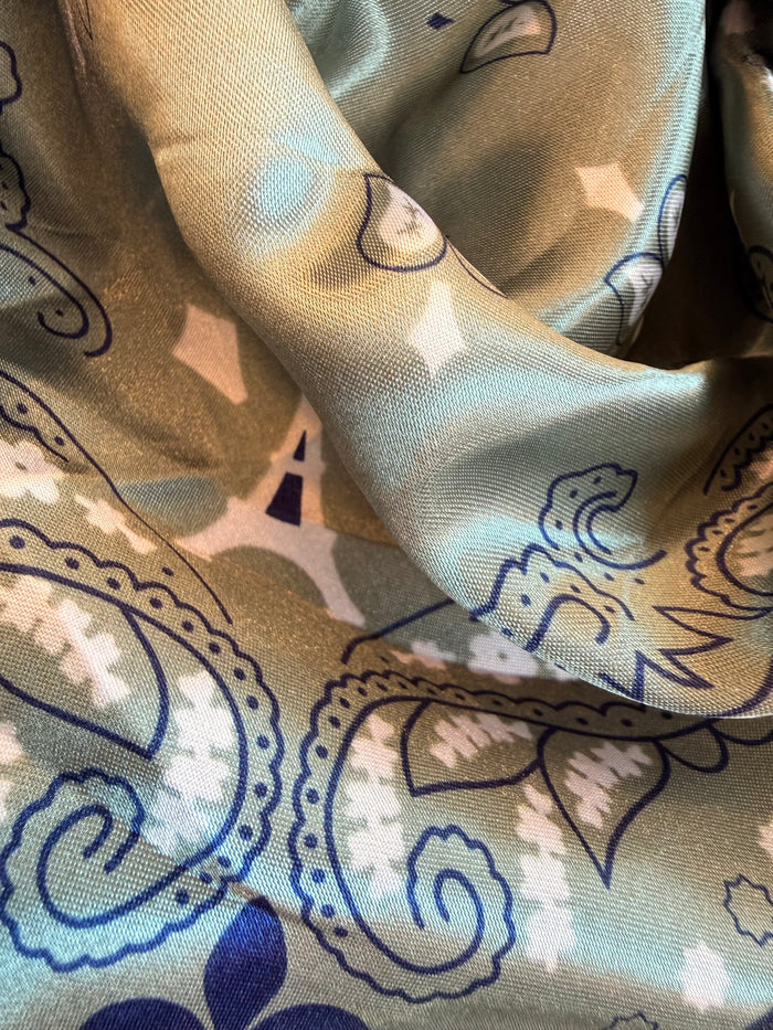 Wild rag scarf with navy and cream paisley and star geometric print, lightweight fabric