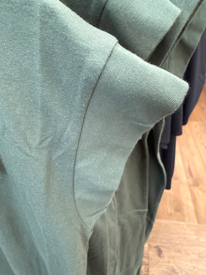 Olive knit midi dress fabric close-up, short sleeve and curved side seam