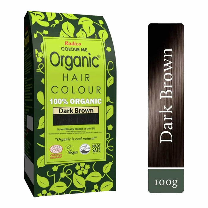 Organic hair colour package with green label and dark brown sample on a white background.