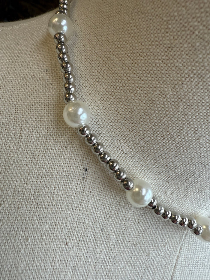 Pearl bead necklace with silver-tone bead links and large white pearls