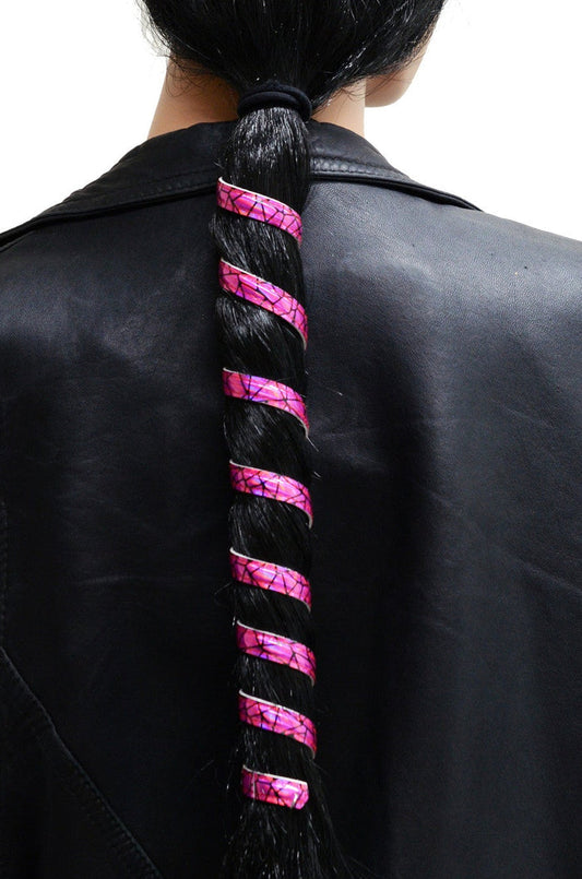 Model wearing 12 inch hot pink holographic anodized aluminum ponytail wrap, spiral design, back view in ponytail