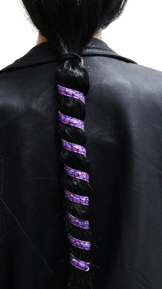 Model wearing 12 inch purple holographic anodized aluminum ponytail wrap, spiral design, back view worn in a ponytail