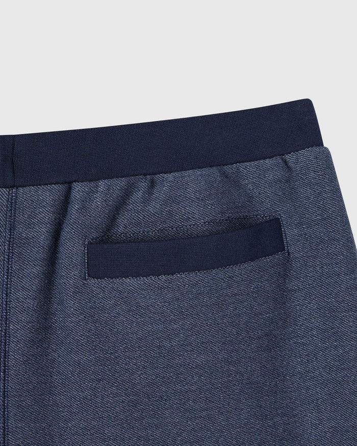 Royal navy reverse French terry sweatshort with ribbed waistband and diagonal texture pocket detail.