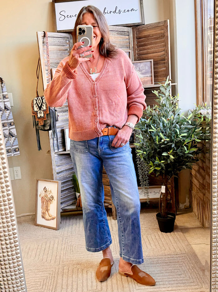 Dusty pink button-front knit cardigan with ribbed hem and cuffs, V-neck.