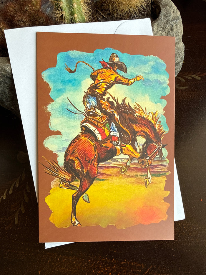 Saddle bronc note card with colorful western rider and horse illustration, orange and teal